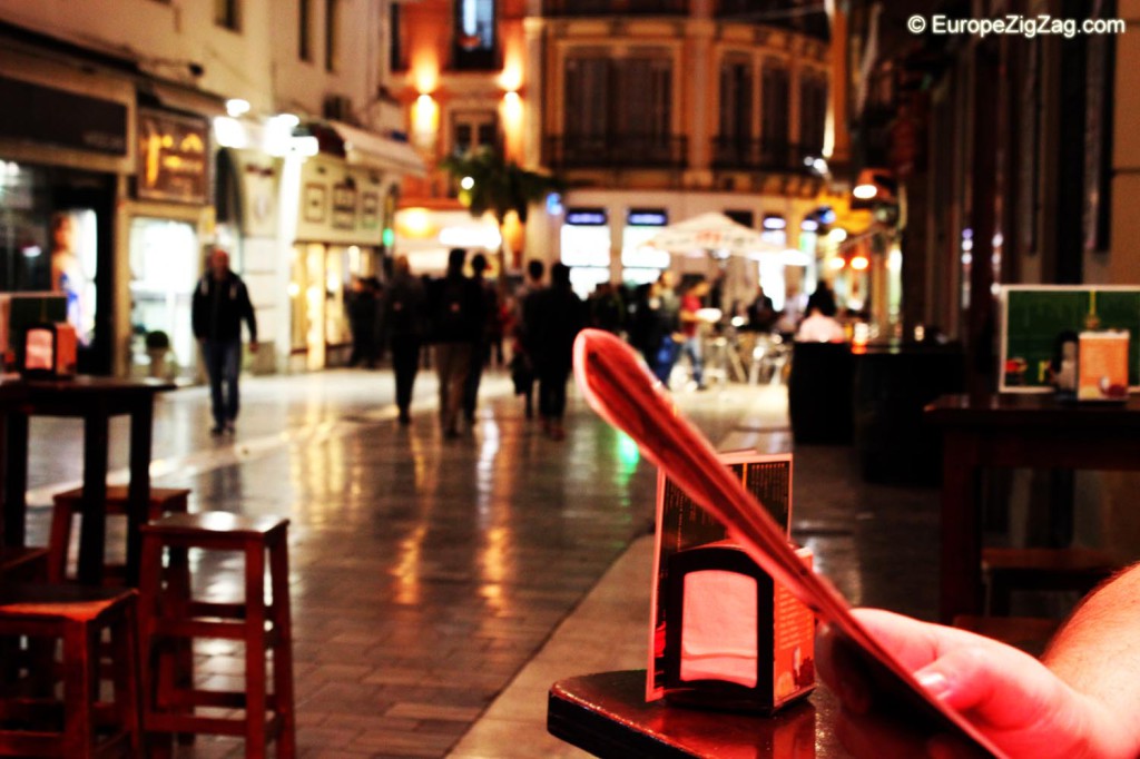 Nocturnal scene from a tapas bar in Malaga, Spain.