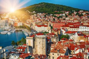 Split in Croatia. Sun shining above the coastal city.