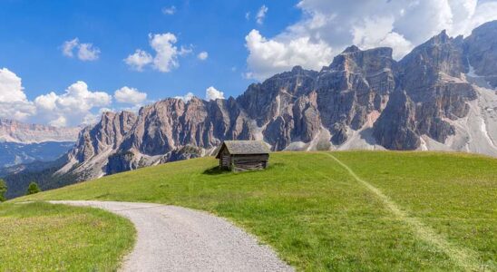 The Dolomites in Italy, a cabin with a majestic background