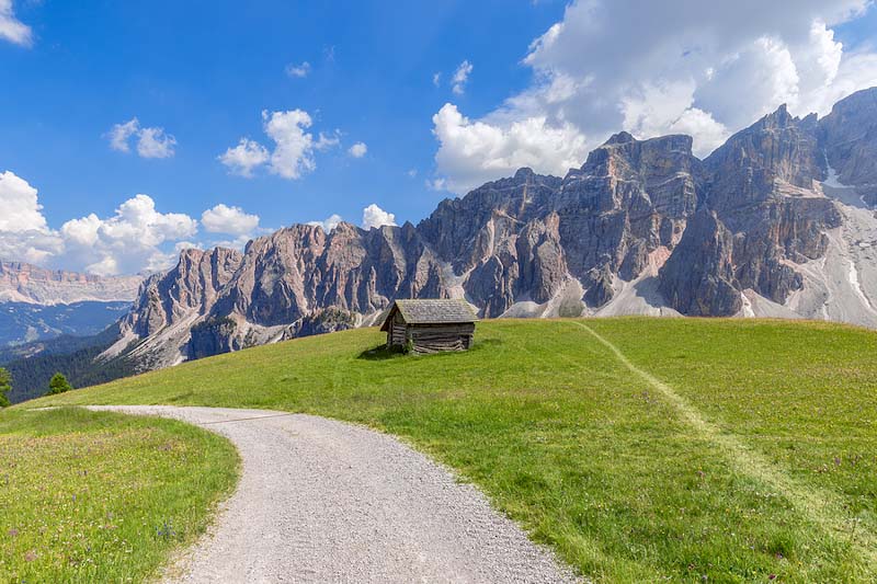 The Dolomites in Italy, a cabin with a majestic background