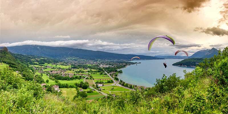 Paragliders by the lake of Annecy, France