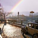 Classic car in Prague with rainbow in the background