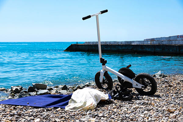 Scooter on the beach on a sunny day