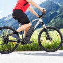Man Riding Electric Mountain Bike Or E Bike In Alps