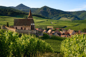 Sunset in Alsace with medieval setting, in France