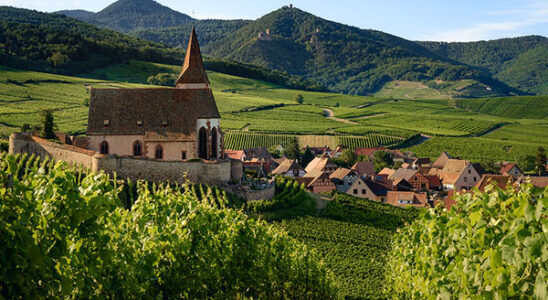 Sunset in Alsace with medieval setting, in France