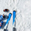 Skis and mask in the snow