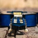Blue guitar on wood planks
