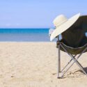Beach chair and lady's hat.