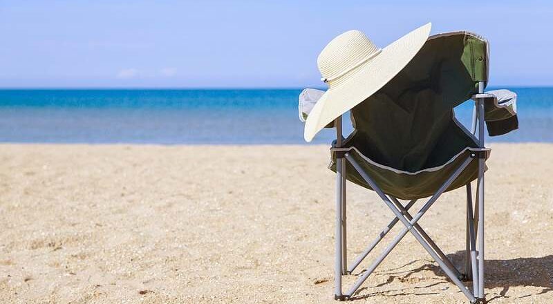 Beach chair and lady's hat.